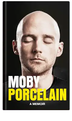 Moby's face on a black background