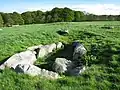 Stone cist from the Late Stone Age reconstructed in the field "Jens Michelsens toft."