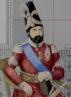 Portrait of a monarch wearing ornate Persianate-European royal clothes.