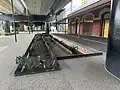 The remnant of the former ground level railway tracks on display, November 2024