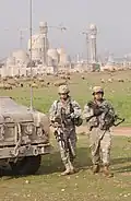 U.S. troops patrol the area around the mosque, in 2007
