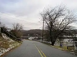 Lakeside Drive West northbound in the community and the lake in the background