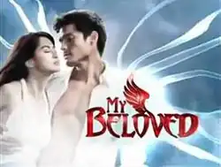 An image of Marian Rivera and Dingdong Dantes, over a background of clouds. The series title is displayed on the lower center right side of the image.