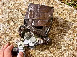 Necco Wafer Memorial Sculpture, 1998, cast bronze, located in University Park at MIT near the former Necco factory in Cambridge, Massachusetts