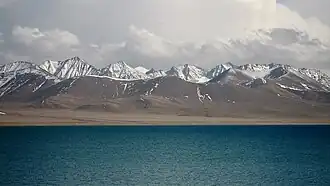 Namtso Lake with the Nyenchen Tanglha mountains in the background.