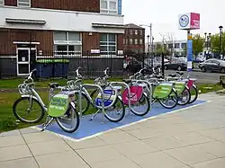 Nextbike cycle hire point with People Make Glasgow branding