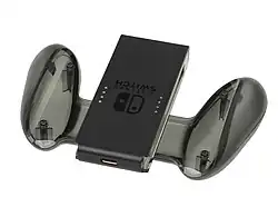 The charging grip upside down, with the USB-C port visible