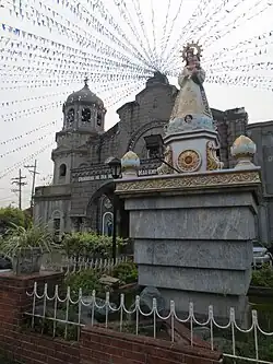 Nuestra Señora de los Desamparados fronting the church