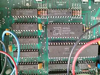 Mainboard. An AMD P8259A Programmable Interrupt Controller is visible, together with a NEC V20 (μPD70108) main processor (instead of an Intel 8088)