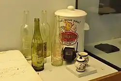 Photo of Martin Pouret vinegar bottles and a Dessaux Fils mustard dispenser