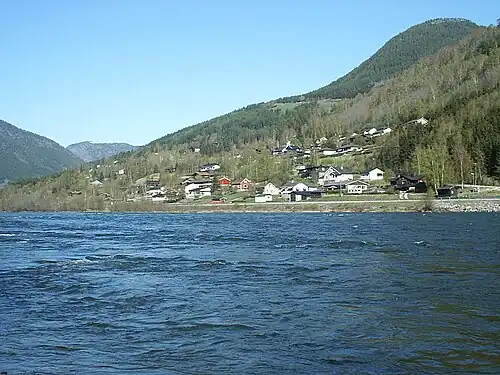 View of the village from the south bank of the river, facing north.