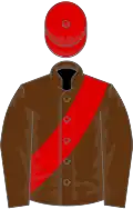 Brown, red sash and cap