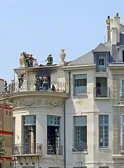 East end of the Gallery of Hercules and the floor above