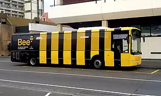 A Palmerston North urban-services bus, with a livery promoting the usage of the Bee Card ticketing system