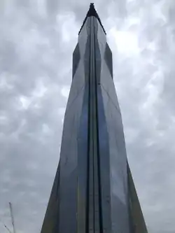 The glass elevator shaft in the middle