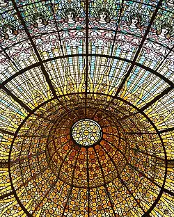 Stained glass ceiling of Palau de la Música Catalana by Antoni Rigalt (1905–1908)