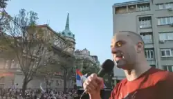 Damnjan Knežević, leader of the People's Patrol, speaking at a pro-Russian protest in April 2022
