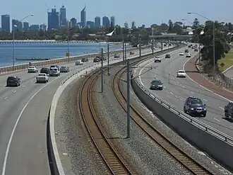 The Kwinana Freeway in Perth, Australia contains the Mandurah railway line