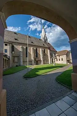 View of the White Tower and Parrish Church from the cloister