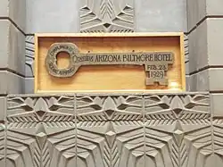 The Wooden key on display above the fireplace in the History Room.