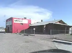 The K.L. Tang Grocery building was built in 1942 and is located at 1141 East Buckeye Road. The "Tang House" was built in the early 1900s. This property is recognized as historic by the Asian American Historic Property Survey.