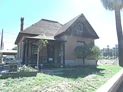 The Louis Emerson House was built in 1904 and is located at 623 N. 4th St. Emerson was a butcher for the "Palace Meat Market". He used to advertise "Meat fit for a king." Designated as a landmark with Historic Preservation-Landmark (HP-L) overlay zoning. It was listed in the Phoenix Historic Property Register
