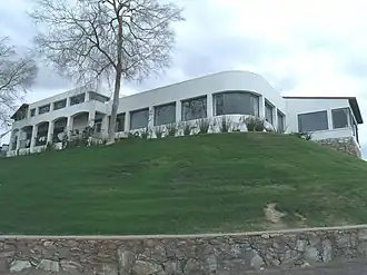 The Wrigley Mansion was built between 1929 and 1931. It is located at 2501 East Telewa Trail. The historic mansion was built by chewing-gum magnate William Wrigley Jr. It is also known as "La Colina Solana". The mansion has been designated as a Phoenix Point of Pride. The mansion was listed as the "William Wrigley Jr., Winter Cottage" on the National Register of Historic Places on August 16, 1989, ref.: #89001045.