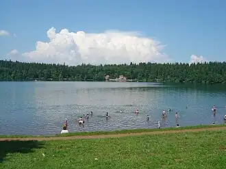 Beach at Lake Bouchet, with restaurant on the far side