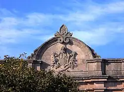Spanish coat of arms at the top of the building