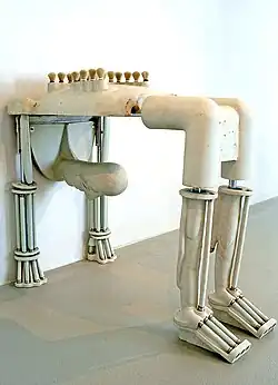 Breasts in a Different Way (1996–1997), porcelain, shaving brushes, 120x97 cm