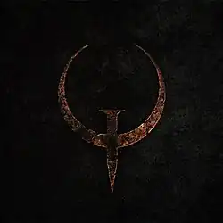 The rusted metal "Q" logo for the Quake video game series