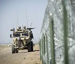 No. 51 Squadron RAF Regiment Foxhound vehicle on patrol at the perimeter of Camp Bastion, Afghanistan in 2014.