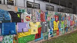 View of the wall graffitied by the 4KM project on Radial Leste.