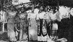 Filipino women dressed for church in 1923, variously wearing terno and baro't saya
