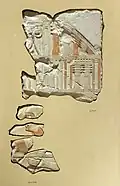 Fragments of a relief depicting Kheti sitting in an armchair under an elaborate canopy