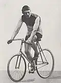 A male cyclist riding his bicycle