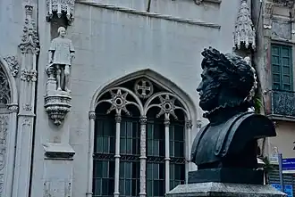 Statues and bust of Luís de Camões at the façade