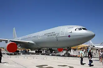 A grey airliner converted for military use as an aerial refuelling tanker is parked at Airbus factory of Getafe, Spain.