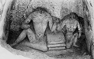 Royal couple. The King wears a Central Asian caftan with double lapel, as well as boots, while the Queen is of Indian type.[23] circa 700 CE.[24][25]