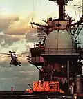 SH-3 Sea King over USS Guam in 1973.