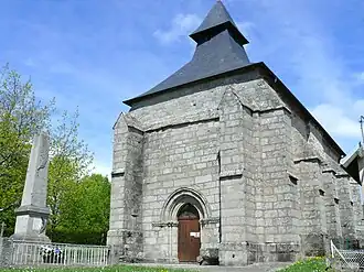 The church of Saint-Marc-Sainte-Agathe and the war memorial, in Saint-Marc-à-Loubaud