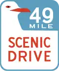 The route signage is a seagull on a blue background with "49-Mile Scenic Drive" labeled