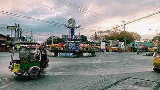 The Rotary Club rotunda at the intersection of Rizal, Bonifacio and Aurora Quezon streets at sunset in 2024