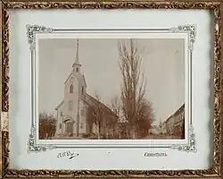 Exterior of the first church (1872-1900)
