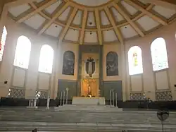 Main altar, with a mosaic of Saint Dominic