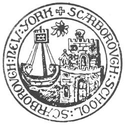 A school seal depicting a castle and ship