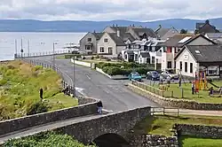 Village centre with Harbour Shop, looking west toward Kintyre