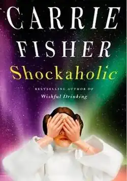 Image of a doll of Carrie Fisher's character Princess Leia with its hands over its eyes.