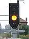 Simplified stop signal displaying 'track clear' (yellow)