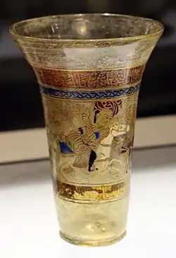 Beaker with polo players, Syria, 1250–1300, with gold and enamel, found in Italy
